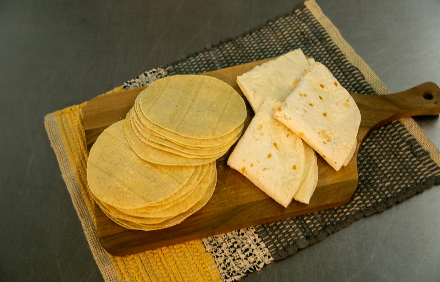 Restaurant kitchen with a stack of Leal's corn tortillas ready for service, Muleshoe TX.